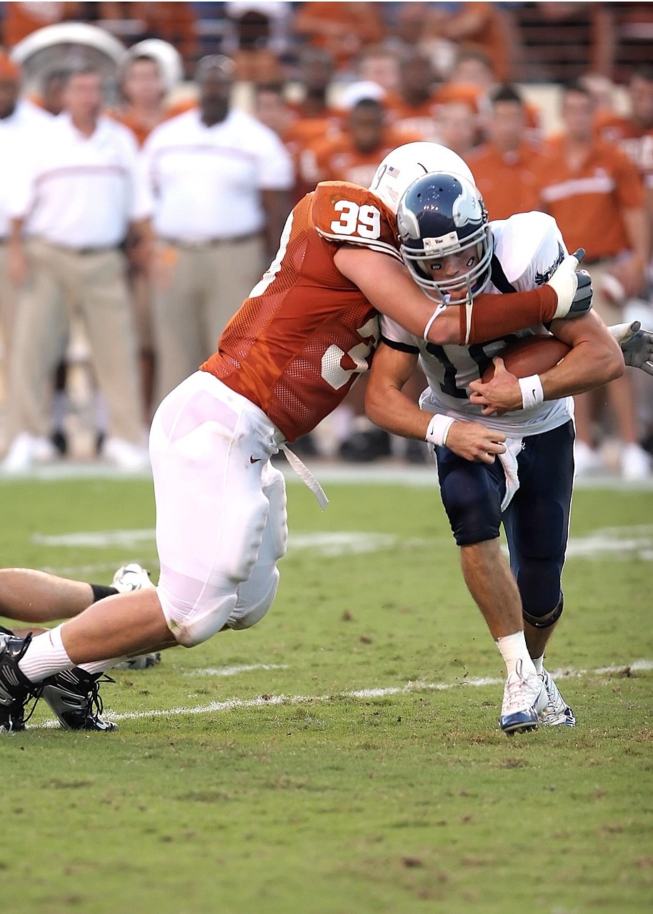 football, american football, sport, ball, game, play, football american, pigskin, team, competition, american football player, athlete, american football field, field, football player, football game, action, competitive, tackle, stop, uniform, college, ncaa, male, texas, athletic, compete, ball carrier, texan